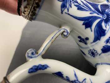 A Chinese blue and white silver-mounted ewer and cover, Transitional period